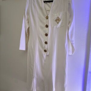 White vintage Michael B. Ltd. jumpsuit with gold monogram
